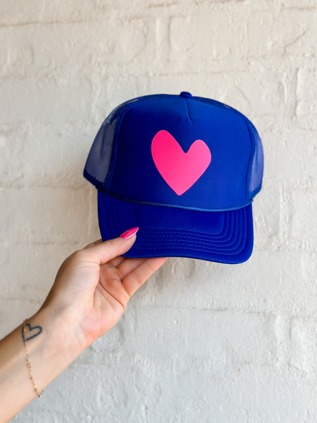 Pink heart trucker hat